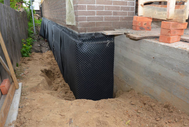 Happy homeowners after waterproofing job in DeForest